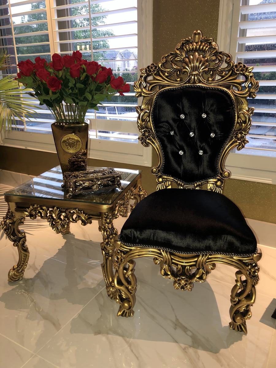 Black and gold luxury chair at PHD Furniture